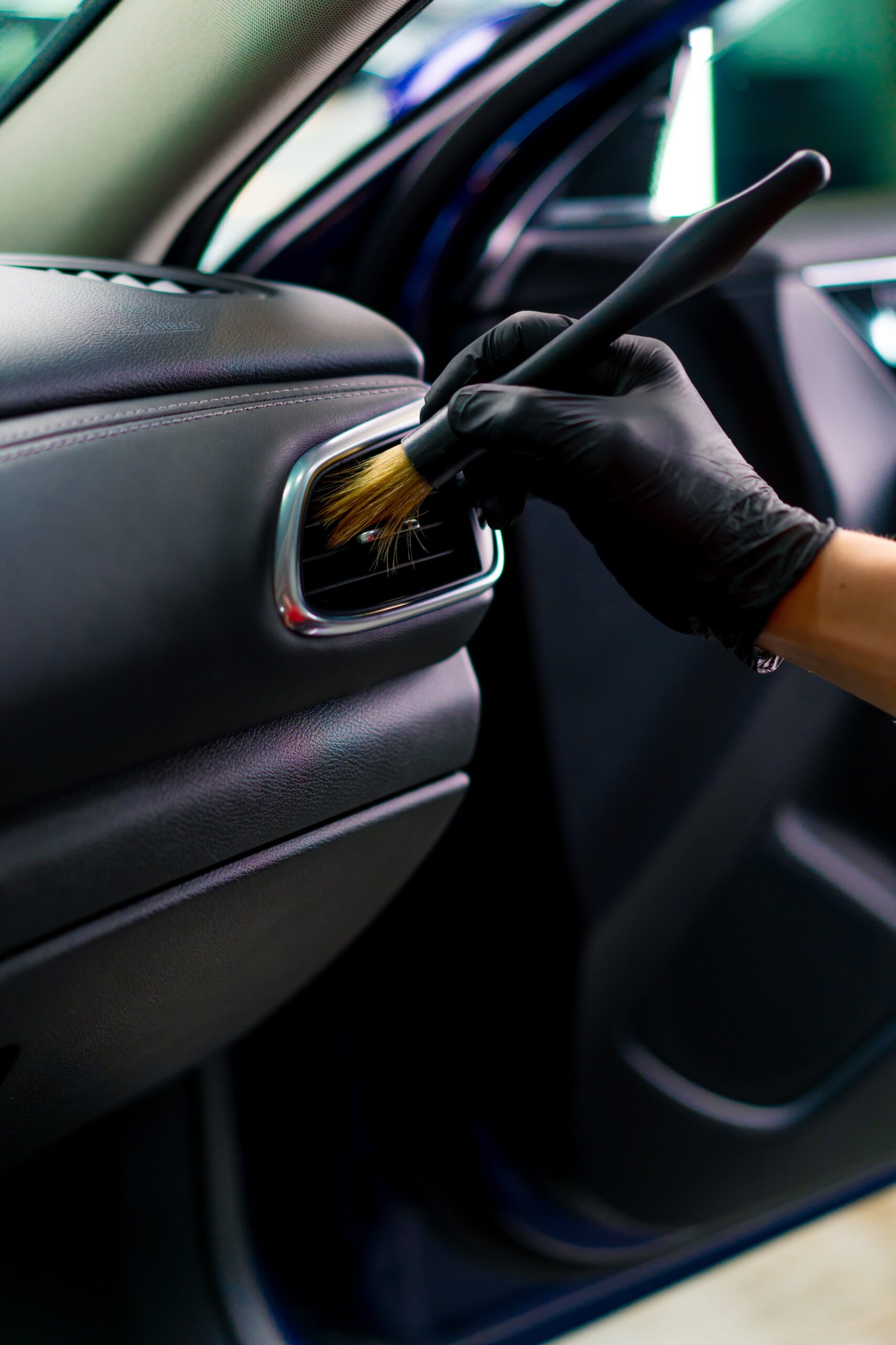 car-wash-worker-thoroughly-cleaning-the-interior-o-2024-12-02-17-08-36-utc-min